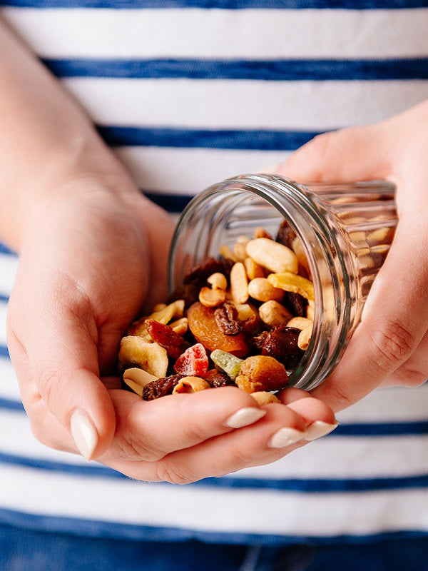 Holding a jar of nuts